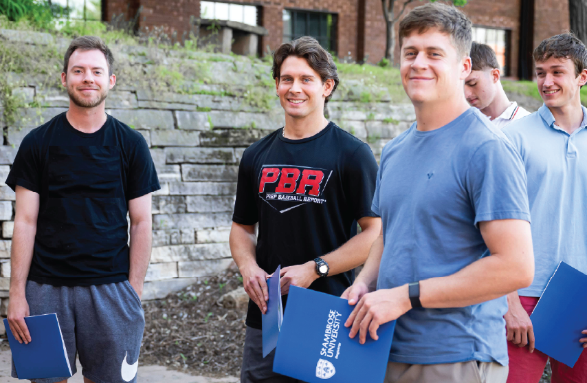 Group of male students smiling