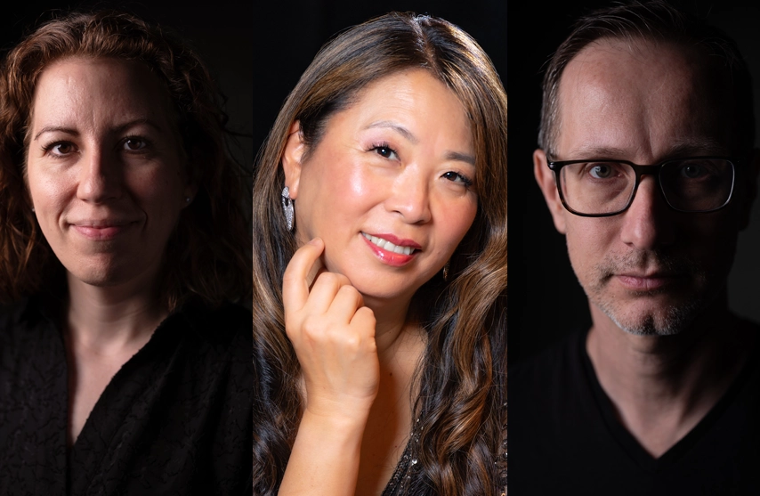 Performers Marian Lee, Chris Reno, and Lily Thompson smile at the camera against a black background.
