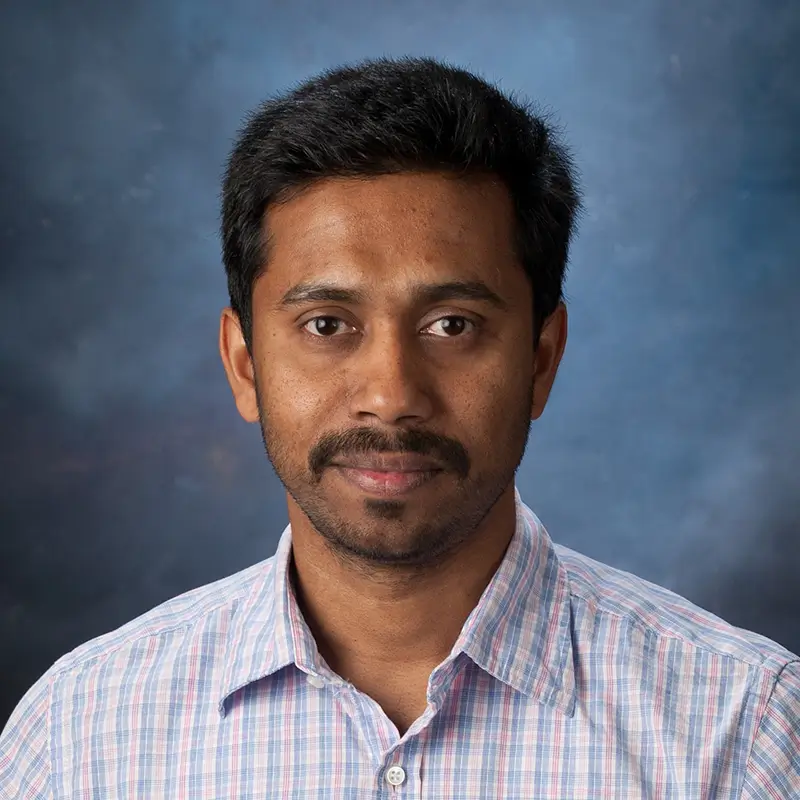 Headshot of Johny Augustine