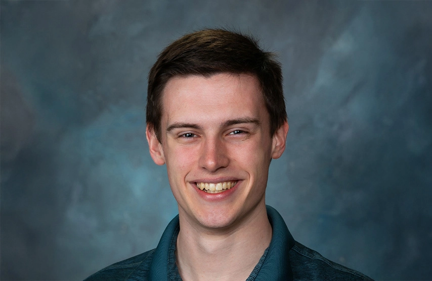 Bryan Hurd smiles at the camera.