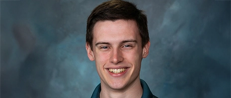 Bryan Hurd smiles at the camera.