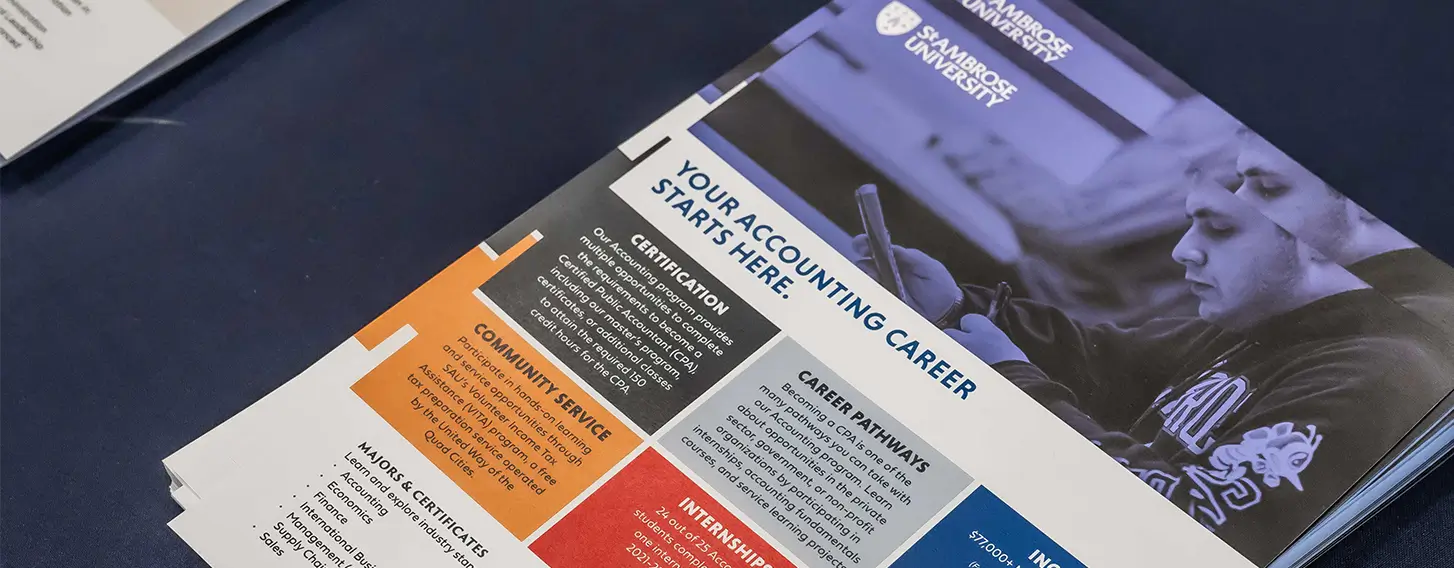 A table with brochures showcasing information about accounting careers.