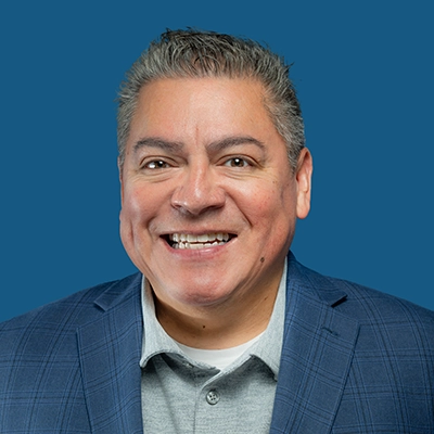 Phil Cervantes smiles into the camera.