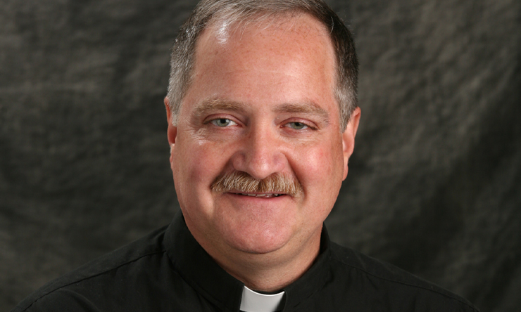 Fr. Chuck Adam receives 2023 McMullen Award