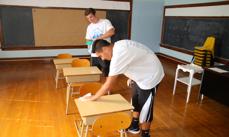 Students Cleaning Classroom